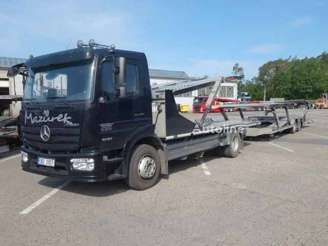 Mercedes-Benz Atego 1530 mit Anhänger für 7 PKW